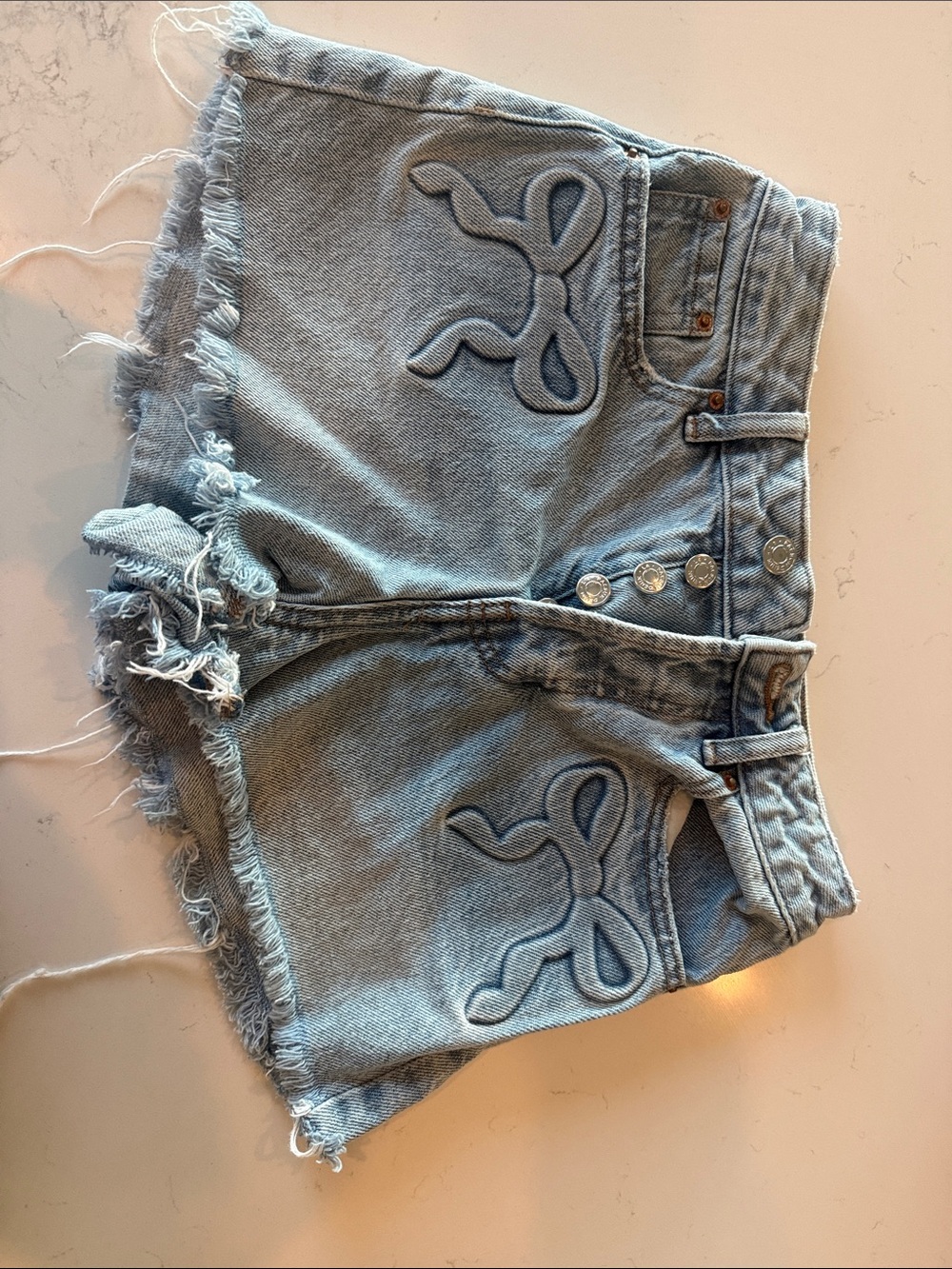 PacSun Light Blue Distressed Denim Cutoff Shorts with Embroidered Detail